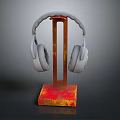 Gray Over Ear Headphones On Red Rusted Metal Stand With Stable Base