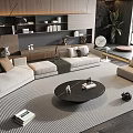 Modern L Shaped Sofa And Round Coffee Table In Living Room With Striped Rug And Decorative Items