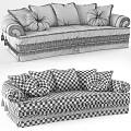 Traditional Green And Beige Two Seater Sofa With Patterned Cushions Decorative Armrests And Fringed Base