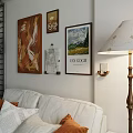 Warm Apartment Interior With Sofa Pillows Coffee Table Green Plant Paintings Floor Lamp And Bookshelf