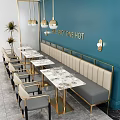 Elegant Modern Restaurant Interior With Teal Wall Gold Pendant Lights Banquette Seating And Marble Tables