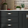 Modern Kitchen With Gray Upper And Black Lower Cabinets Brick Backsplash Sink And Stove
