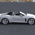 Luxury White Convertible Car With Sleek Body Front Grille And Alloy Wheels