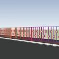 Colorful Railings On Pedestrian Bridge With High Rise Buildings And Sky Background