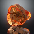 Decorative Ornament Set Featuring Orange Red Transparent Stone With Natural Texture And Glossy Reflection