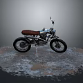 Vintage Motorcycle with Silver Body and Brown Leather Seat Parked on Weathered Ground