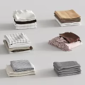 Neatly Folded Clothes in Various Colors and Patterns Arranged Together Neatly