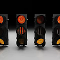 Four Illuminated Outdoor Traffic Lights With Black Housing And Red Yellow Green Lamps