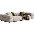 Modern Beige Sectional Sofa With Green Pillows And Brown Throw Blanket 3d model
