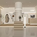 Minimalist Clothing Store Interior With White Column Clothing Racks Mirrors And Display Stand