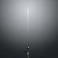 Person Standing Under Tall Vertical Pole Against Gray Background