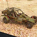 Military Style Green Off Road Car With Metal Cage In Desert Sand Terrain