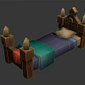Wooden Bed with Carved Posts Pointed Tops Green Ornament Blue Bedspread Turquoise Blanket