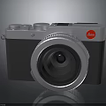 Leica Digital Camera With Silver Body Gray Accents And Classic Lens Design