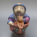 Colorful Bearded Figure Sculpture Carving Holding Orange Cat With Decorative Hat