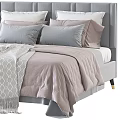 Modern Double Bed with Upholstered Headboard Soft Beige Pink Quilt Pillows and Textured Blanket