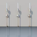 Three Modern Wall Sconces With Sleek Metal Design Mounted On Light Wall 3d model