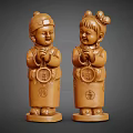 Traditional Wooden Boy And Girl Figurines In Traditional Clothing Holding Round Plaques