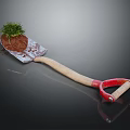 Garden Shovel With Wooden Handle And Red Grip For Planting Small Plants In Soil