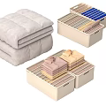 Neatly Organized Folded Clothes With Various Colors In Beige Storage Boxes