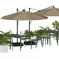 Outdoor Garden Table and Chair Set With Beige Umbrellas And Green Plants