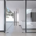 Modern Interior Featuring Black Frame Glass Sliding Doors White Walls Green Plants Light Flooring