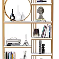 Modern Decorative Cabinet with Golden Frame and White Shelves Displaying Vases Books and Sculpture