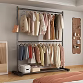 Double Layer Metal Clothes Hanger with Colorful Clothes and Storage Box in Bedroom