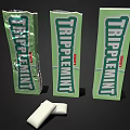 Triplemint Gum Green Packaging Boxes With White Gum Pieces On