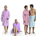 Group of People in Different Poses Wearing White Bathrobes and Towels
