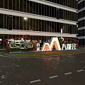 Modern Urban Photo Spot With High Rise Buildings Circular Sign And Street Lights