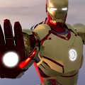 Iron Man Game Movie Character With Gold Red Armor And Glowing Palm Energy Ball