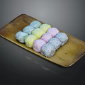 Colorful Glutinous Rice Cakes Arranged On Wooden Tray With Coconut Coating
