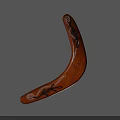 Traditional Brown Curved Weapon With Hand Carved Black Patterns And White Accents