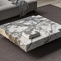 Modern Living Room With Natural Marble Coffee Table And Stacked Books