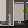Modern Entryway Hallway Featuring Beige Cabinets Marble Pedestal White Statue And Tall Palm Plant With Herringbone Flooring