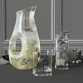 Refreshing Lemonade in Glass Pitcher with Lemon Cucumber Slices Mint Leaves Glasses and Nut Bowl