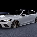Silver Sporty Sedan Featuring Custom Wheels Modern Front Fascia And Sleek Design