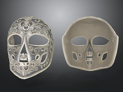 Two Skull Masks Featuring Intricate Ornate Patterns And Plain Simple Design 3d model