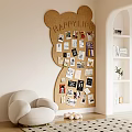Bear Shaped Corkboard Wall Decor with Happy Life Text Photos Cards White Armchair and Bookshelf