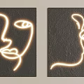 Modern Wall Decor Set of Two With Glowing Line Art Face Silhouette On Black Background
