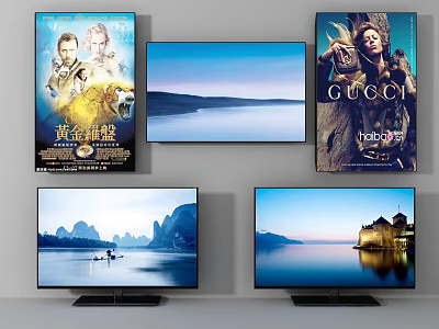 Two Televisions Displaying Scenic Mountain And Castle Views With Posters On Wall 3d model