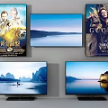 Two Televisions Displaying Scenic Mountain And Castle Views With Posters On Wall