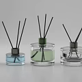 Perfume Cosmetics Transparent Glass Fragrance Bottles with Different Colored Liquids and Black Reeds