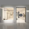 Spacious Clothing Store Interior with Bright Lighting Beige Walls Central Plant and Hanging Coats
