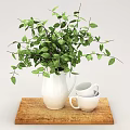 White Vase with Fresh Green Leaves on Wooden Tray and Stacked White Cups