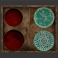 Carved Sculptural Red Bowls And Green Openwork Plates Displayed On Wooden Box