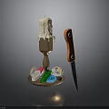 Candle Holder With Melted Candle Colored Gems Skull And Orange Handle Knife