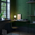 Cozy Desk Setup With Green Wall Window Potted Plant Table Lamp Open Book And Shelves