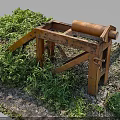Rusty Metal Frame Equipment With Roller Standing Among Green Grass And Gravel